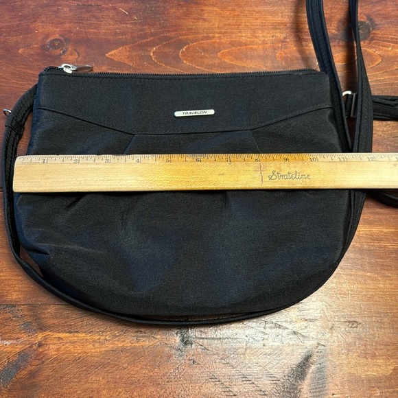 Travelon Black crossbody security travel bag with purse light NWOT - Picture 8 of 9